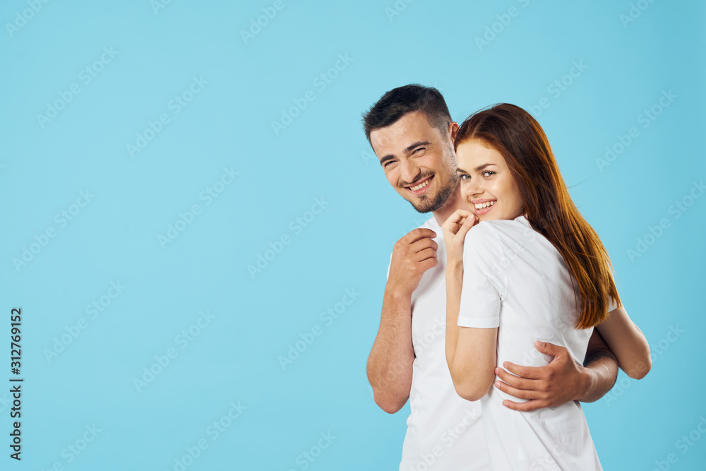 young couple in t-shirts chatting