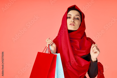 young woman with shopping bags