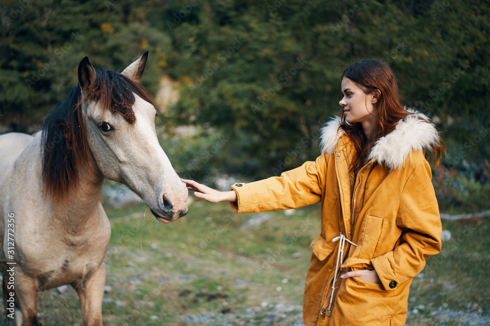 Obraz premium woman and horse