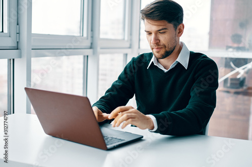 businessman working on laptop in office