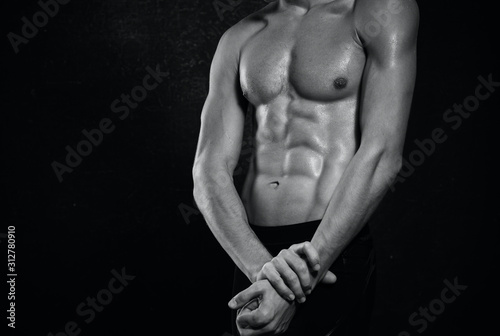 bodybuilder flexing his muscles © SHOTPRIME STUDIO