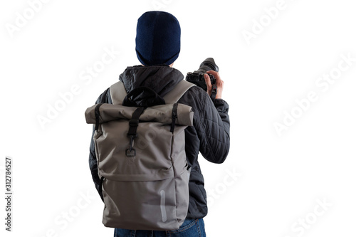 Traveler holds camera.