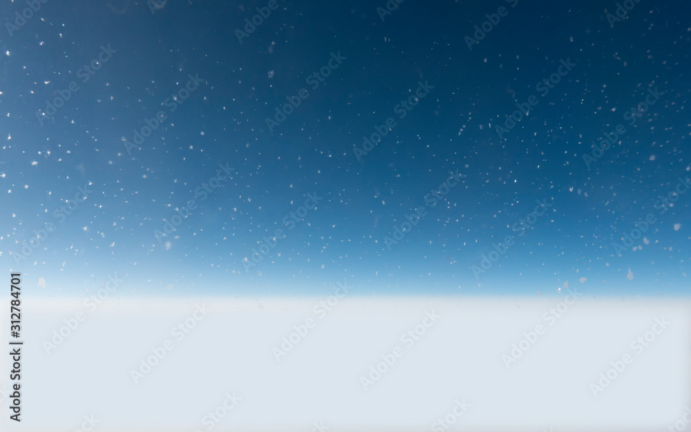 Obraz premium Background with ice crystals on blue sky