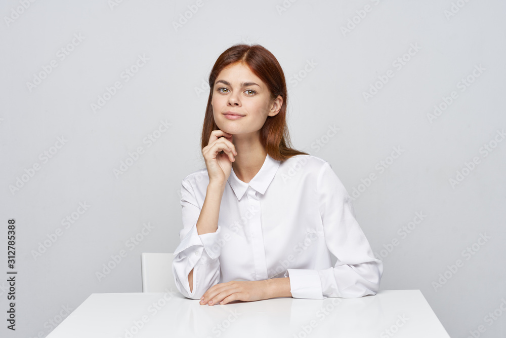 business woman sitting at desk with laptop business woman sitting at desk with laptop