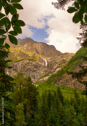 Picturesque landscape in mountains against a sunlight
