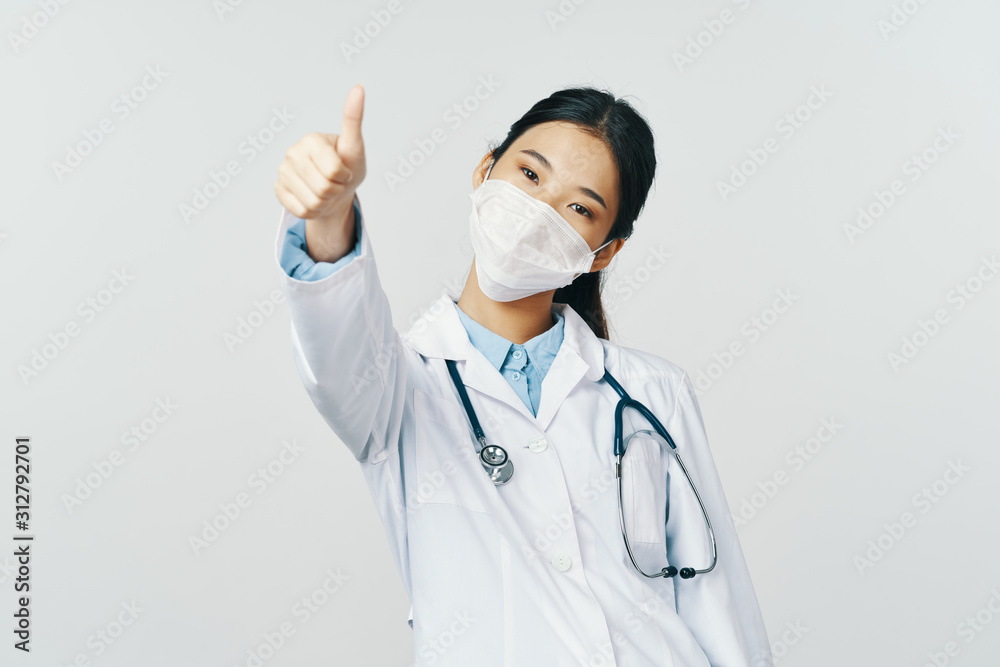 portrait of a young doctor with stethoscope portrait of a young doctor with stethoscope