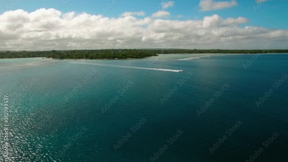 Two Speedboats Sailing Offcoast From Exotic Island In Turquoise Water of Tropical Sea, Cinematic Aerial Two Speedboats Sailing Offcoast From Exotic Island In Turquoise Water of Tropical Sea, Cinematic Aerial