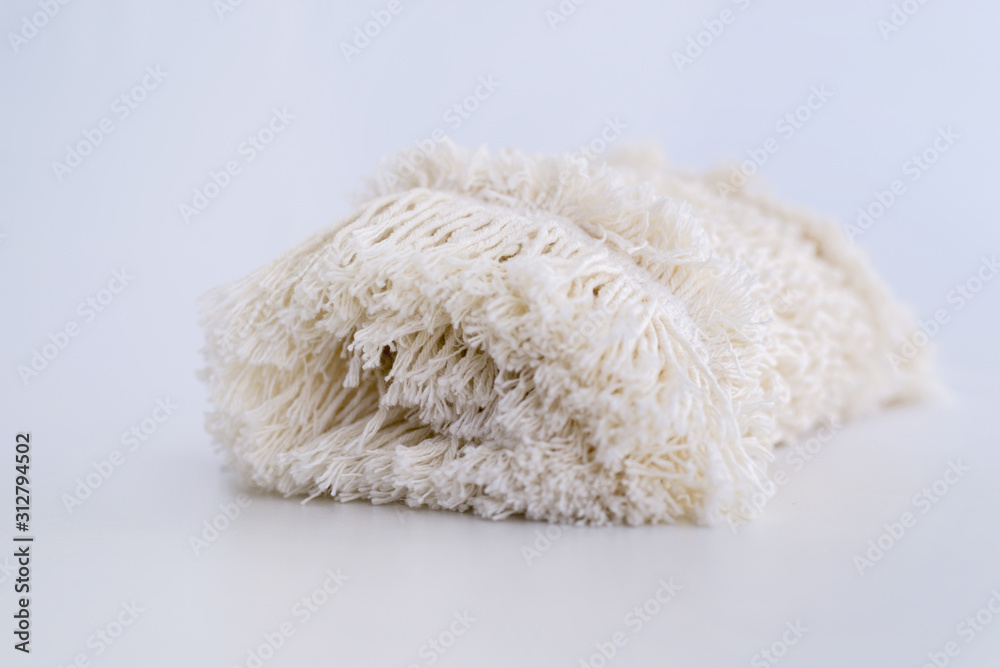White fiber mop for cleaning floor isolated on white background. White fiber mop for cleaning floor isolated on white background.