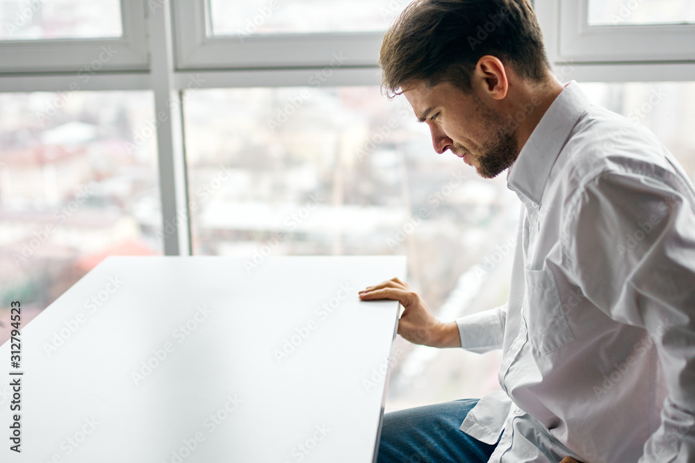 man using tablet computer in office man using tablet computer in office