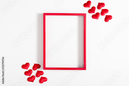 Composition Valentine's Day. Red photo frame and red heart on white background. Valentine day concept, design. Flat lay, top view, copy space © prime1001