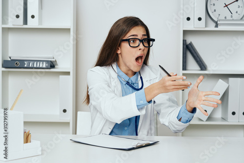 female doctor working in office