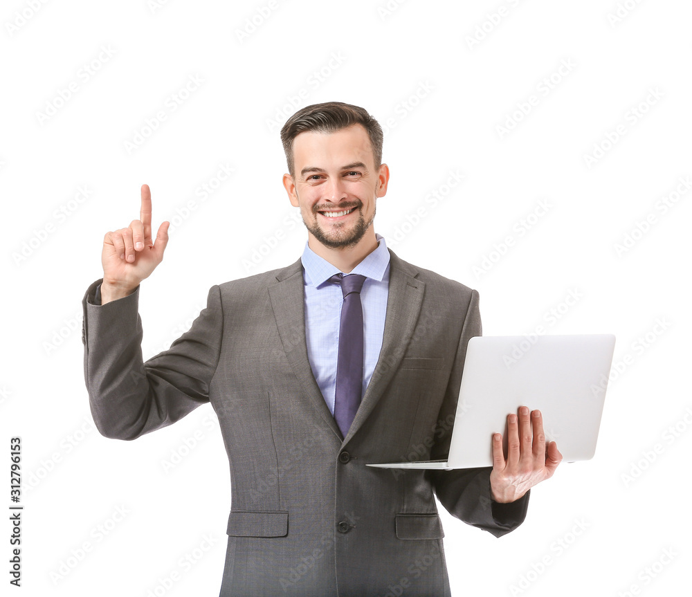 Portrait of handsome businessman with laptop and raised index finger on white background Portrait of handsome businessman with laptop and raised index finger on white background