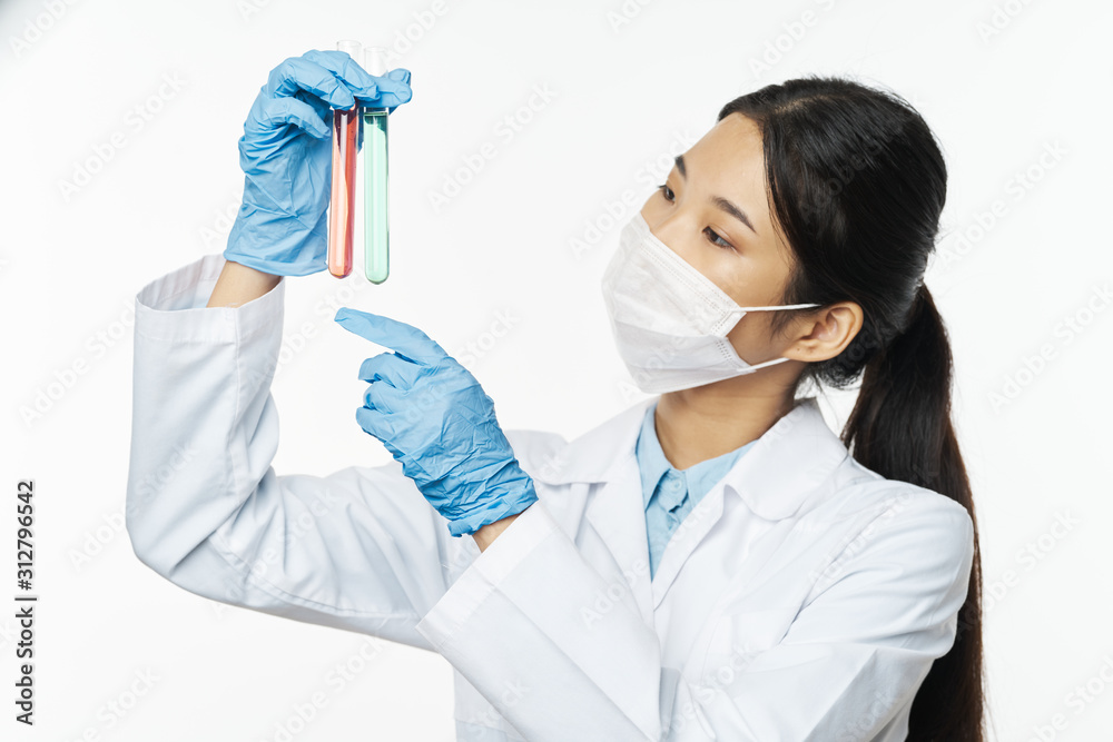 scientist in laboratory with test tubes scientist in laboratory with test tubes