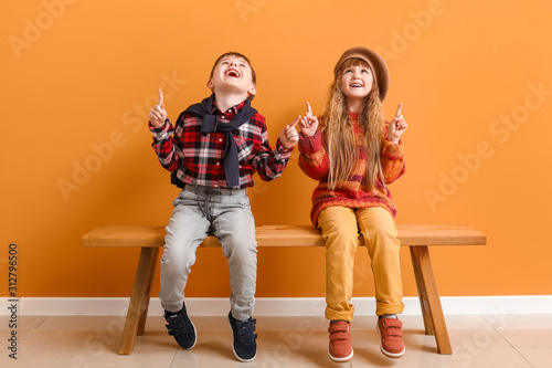 Cute little children in aut...