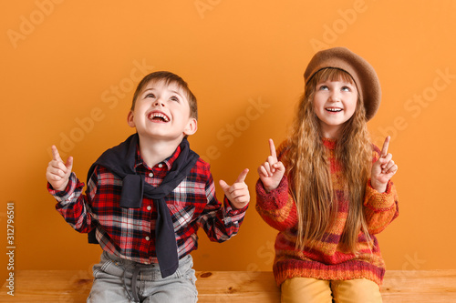 Cute little children in aut...