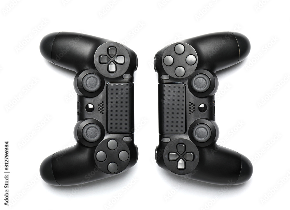 Modern game pads on light background Modern game pads on light background