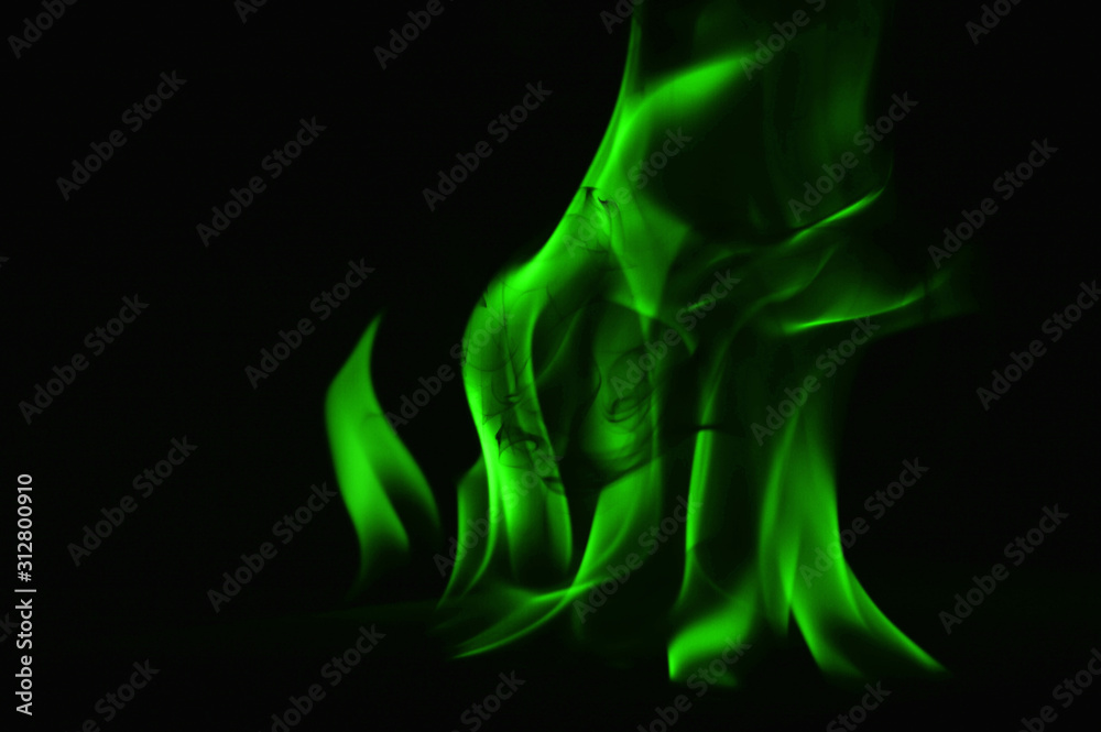 Beautiful fire green flames on a black background.