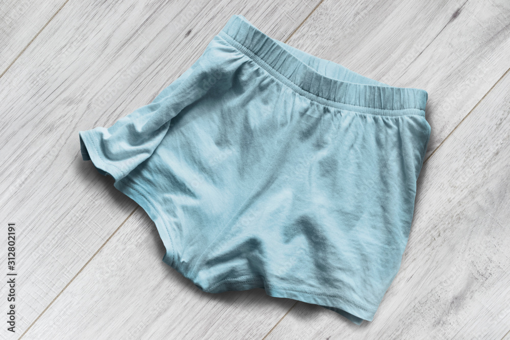 Shorts on wooden background Shorts on wooden background