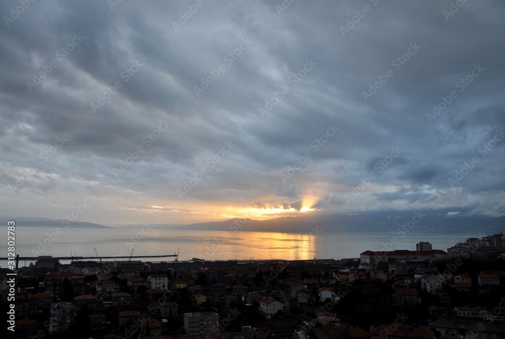 Beautiful Croatian sky scenery. Autumn dramatic sky and adriatic sea on Rijeka shoreline.
