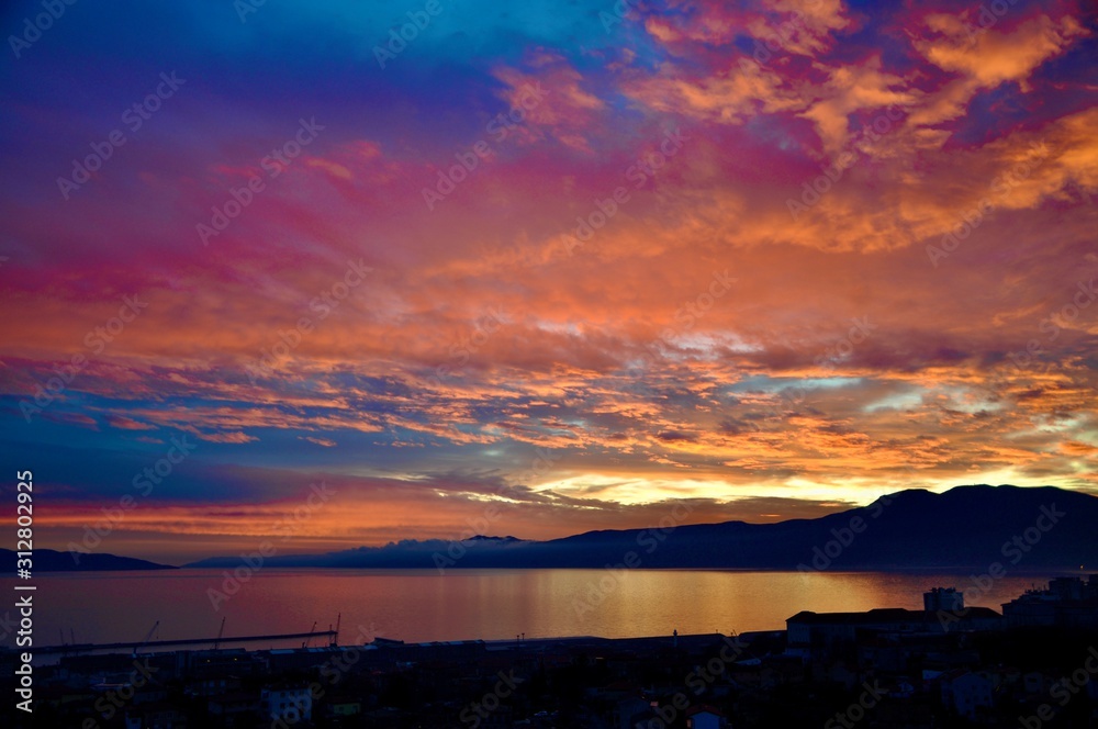Sunset over the city Rijeka and Adriatic sea in Croatia