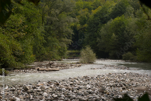 Abkhazia. Jeep trip to the mountains. The Gega waterfall, lake Riza photo