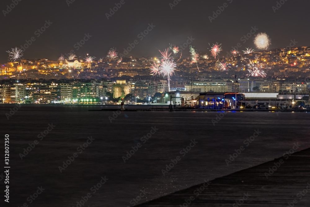 New Years Eve January 01 2020 fireworks at Thessaloniki, Greece.Part of the celebrations for the coming of new year with pyrotechnics at Aristotelous square area, seen from the city waterfront.