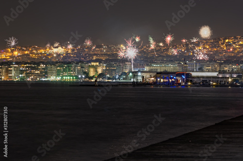 New Years Eve January 01 2020 fireworks at Thessaloniki, Greece.Part of the celebrations for the coming of new year with pyrotechnics at Aristotelous square area, seen from the city waterfront.