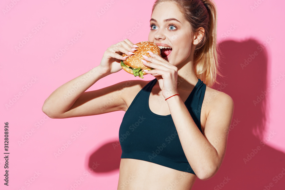young woman eating fruit salad young woman eating fruit salad