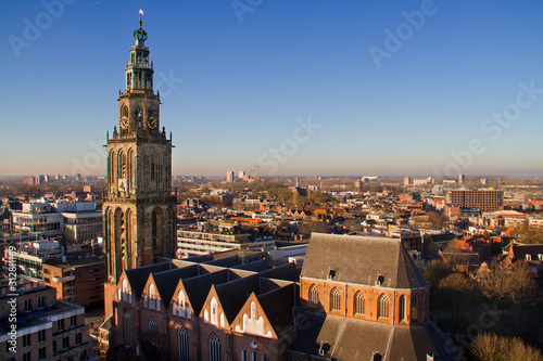 Aerial view over the Dutch city Groningen and the medieval Martini tower, seen from the roof of the Forum photo