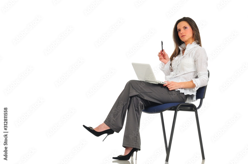 Woman sitting on chair with laptop on lap Woman sitting on chair with laptop on lap