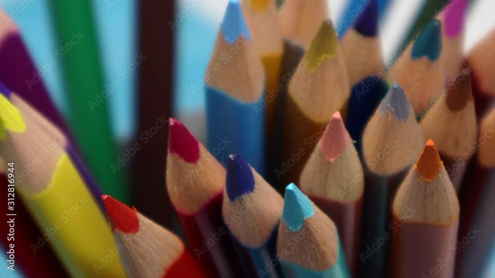 View on multi colored pencils. Close-up view on bright colored pencils for drawing. 4K real time video.