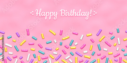 Seamless background of pink candy donut glaze with many decorative sprinkles photo