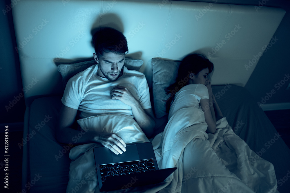 man and woman in hotel room