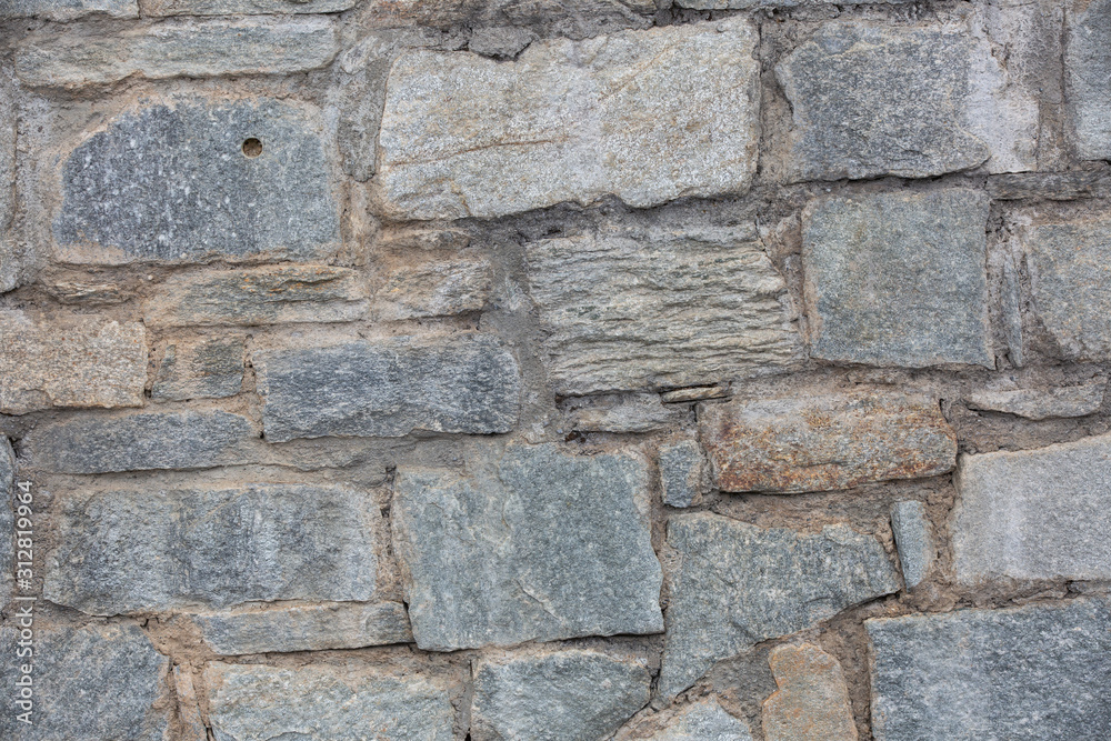 Fragment of an old stone wall Fragment of an old stone wall