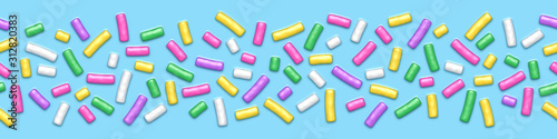 Seamless pattern of blue donut glaze with many decorative sprinkles