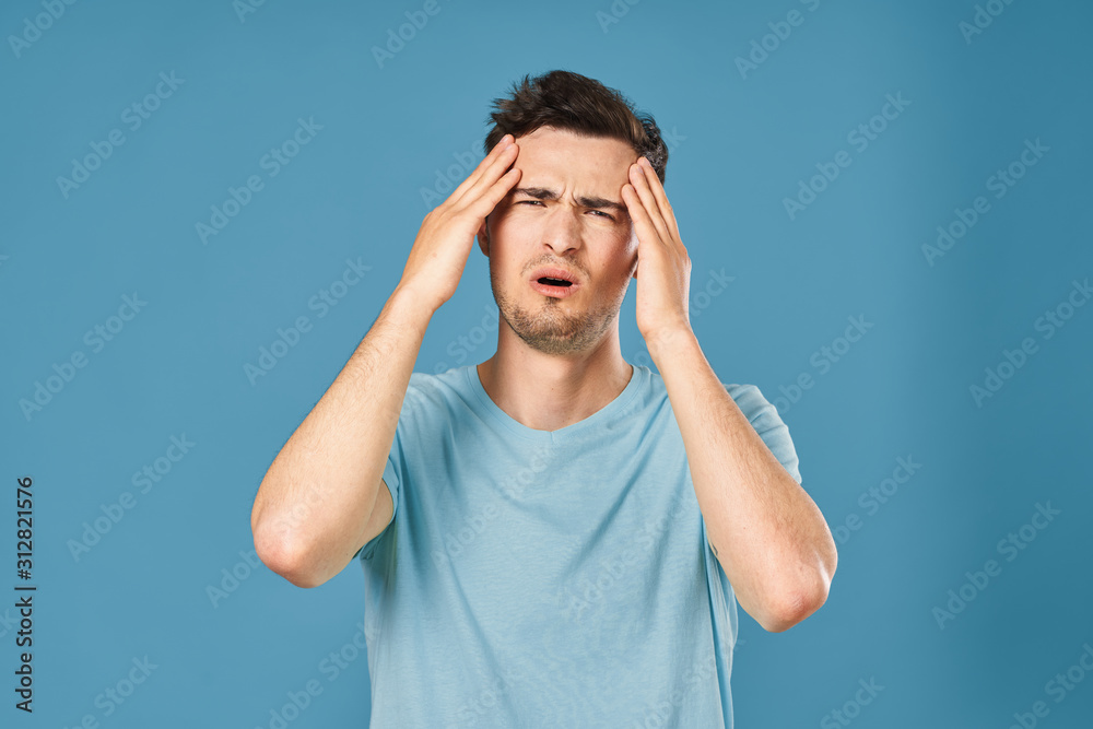 young man with hands on his head isolated on white young man with hands on his head isolated on white