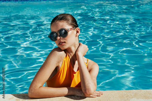 young woman in swimming pool © SHOTPRIME STUDIO