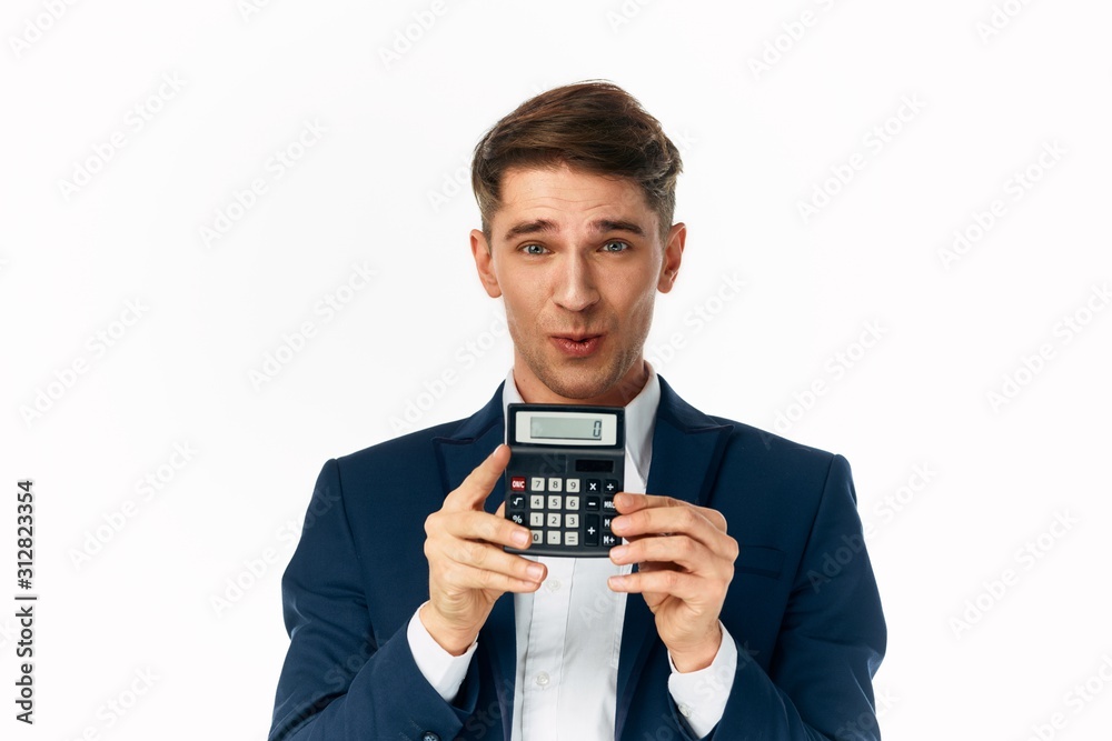 businessman with calculator isolated on white businessman with calculator isolated on white