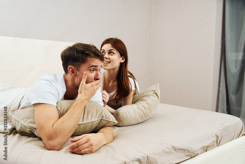 young couple relaxing on sofa at home young couple relaxing on sofa at home