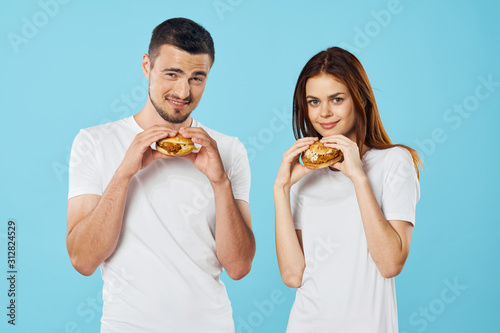 man and woman with pretzel