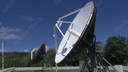 Satellite dishes receive and transmit signal