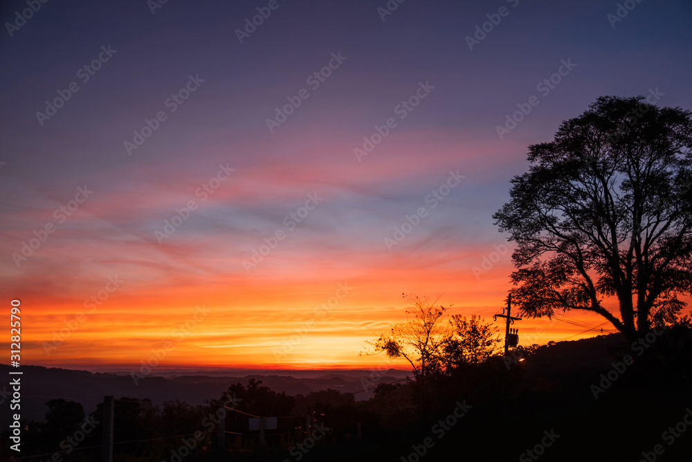 Multicolored clouds and sky at sunset