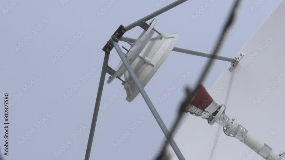 Satellite dishes receive and transmit signal Satellite dishes receive and transmit signal
