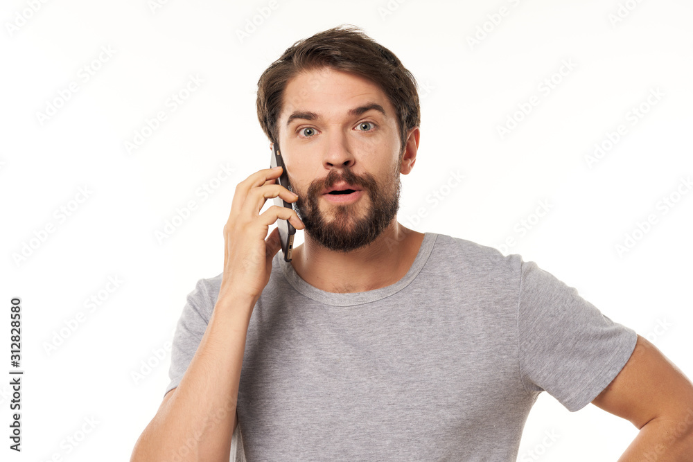 young man talking on the phone young man talking on the phone