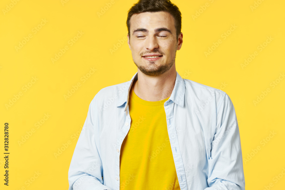 portrait of a young man with arms crossed portrait of a young man with arms crossed