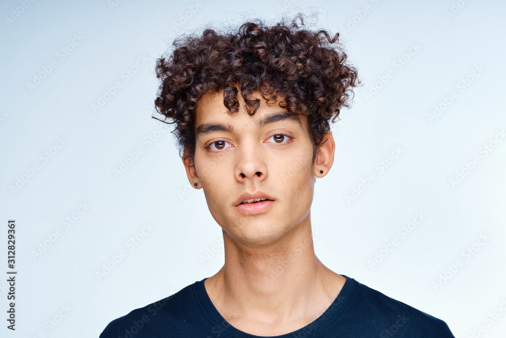 portrait of young man with long hair