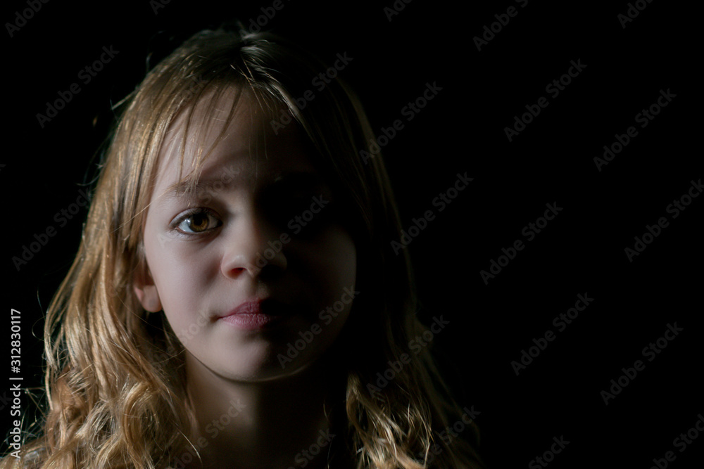 Young girl in front of the camera, portrait Young girl in front of the camera, portrait
