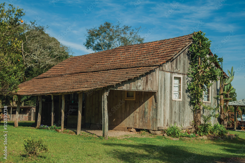 Old wooden shack in a traditional rural style Old wooden shack in a traditional rural style