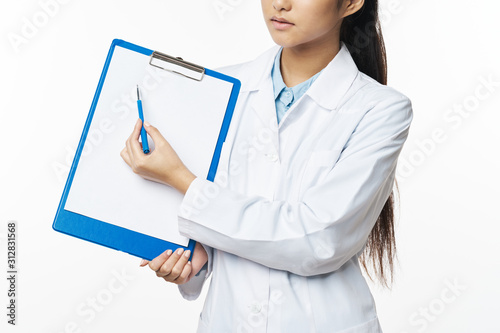 young doctor with clipboard