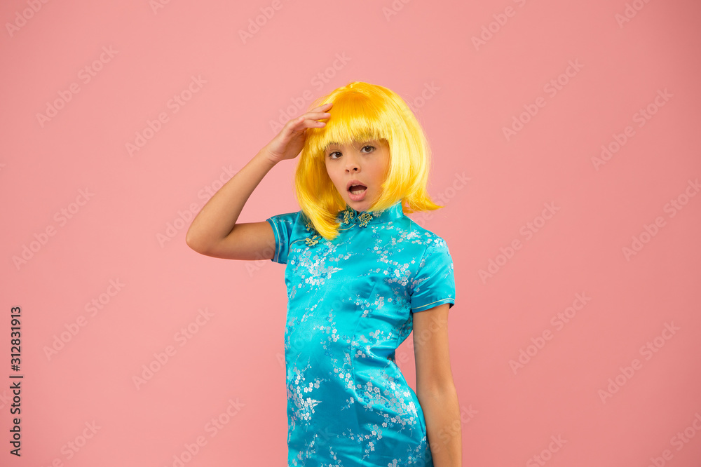 Hobby and entertainment. Pop culture. Anime fan. Child cute cosplayer. Anime emotional expression. Anime admirer. Girl yellow wig. Cosplay character concept. Japanese style. Eastern trends for teens Hobby and entertainment. Pop culture. Anime fan. Child cute cosplayer. Anime emotional expression. Anime admirer. Girl yellow wig. Cosplay character concept. Japanese style. Eastern trends for teens
